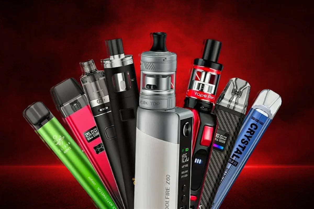 Lineup of different types of vapes, including pod systems, vape pens, box mods, and disposable vapes, displayed in front of a dark red background, illustrating the different types of vapes available in 2025.